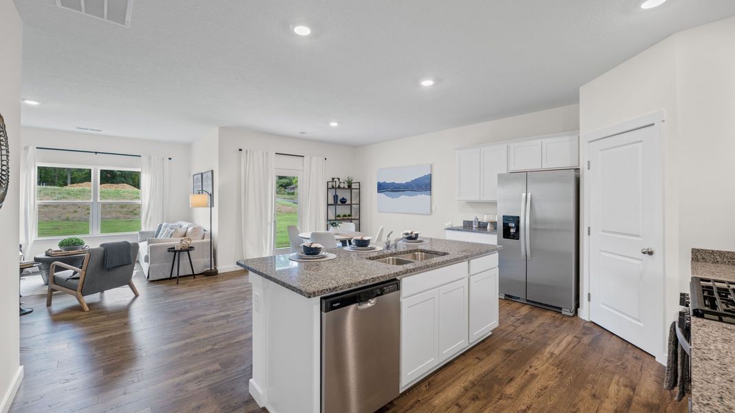Furnished interior in a model home at Hillcrest Landing in McDonald (Image 8).