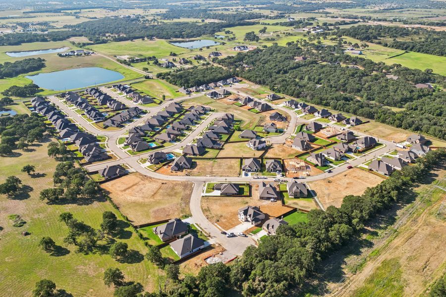 Aerial view of the Oak Hills community in Cross Timber, TX, showing layout and nearby surroundings (Image 10).