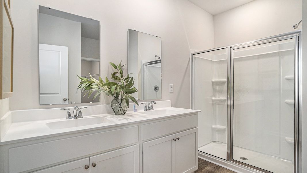 Furnished interior in a model home at South Island landing in Georgetown (Image 7).