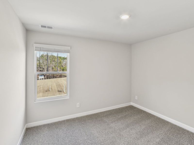 Each secondary bedroom provides an abundance of natural light.