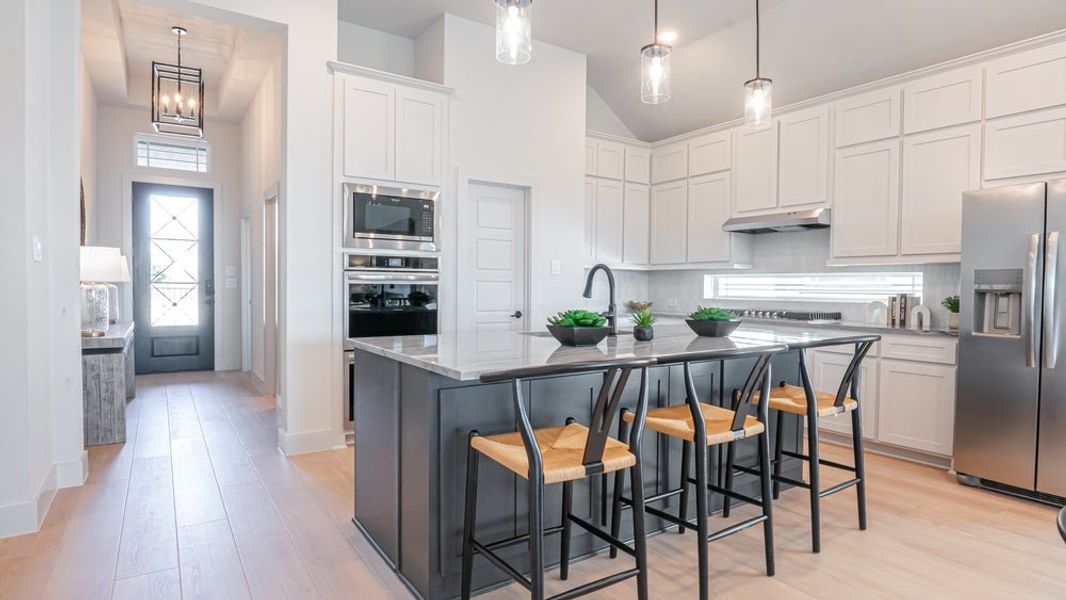 Furnished interior in a model home at Brookfield in Melissa (Image 21). Furnished interior in a model home at Brookfield in Melissa (Image 21).