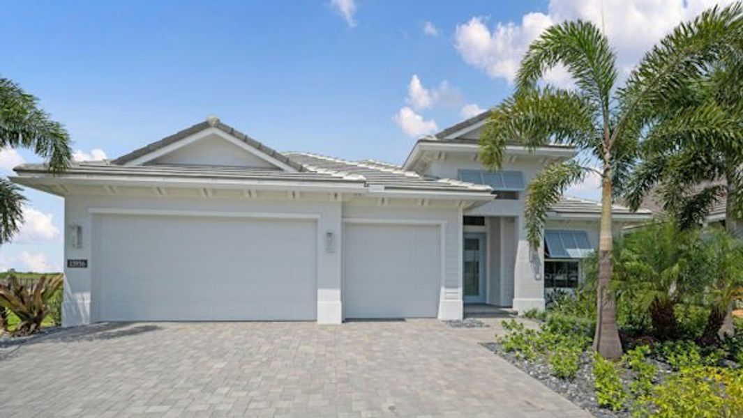 Front exterior of a home in the BELTERRA community, located in Port St. Lucie, FL (Image 56).