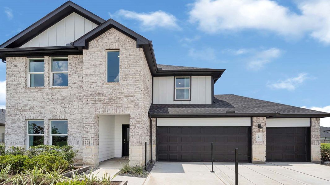 Front exterior of a home in the Evergreen community, located in Rosenberg, TX (Image 4).