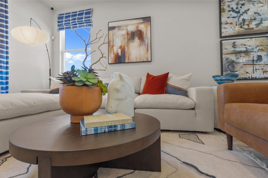 A living room with a couch and a coffee table.