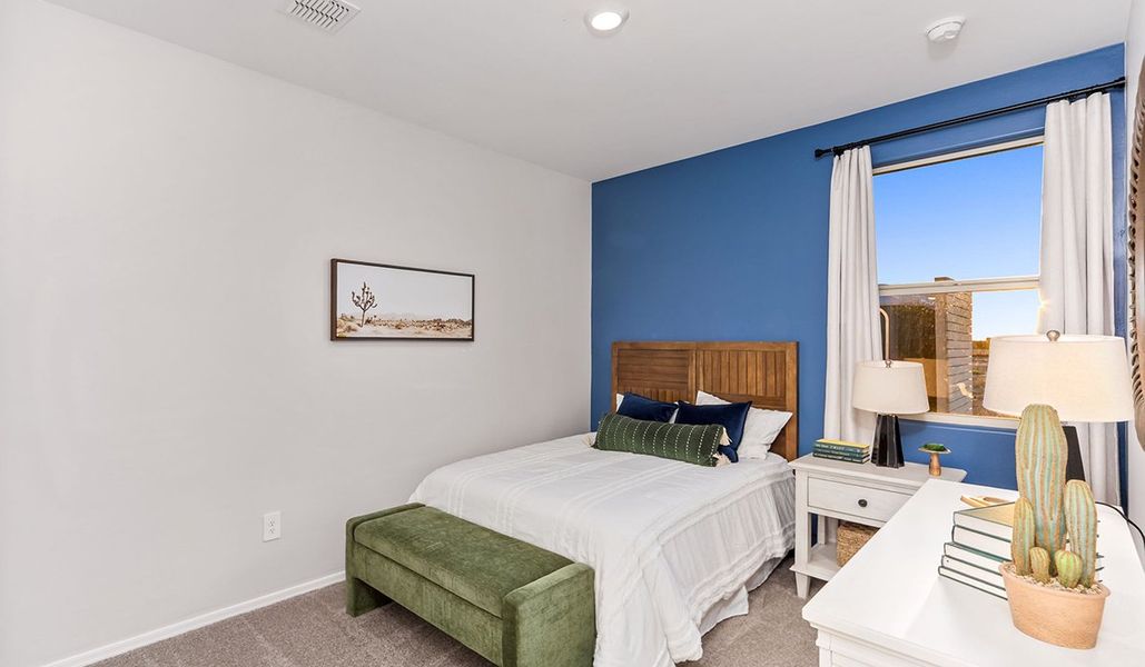 Furnished interior in a model home at Coronet at Gladden Farms in Marana (Image 57).