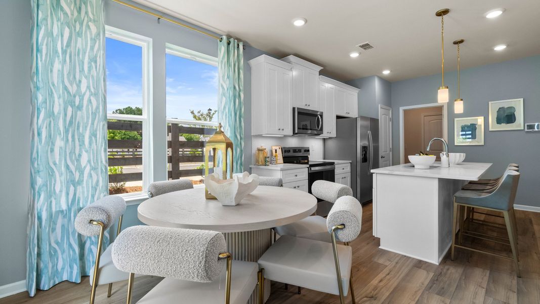 Furnished interior in a model home at McClure Farms Townhomes in Columbia (Image 10).