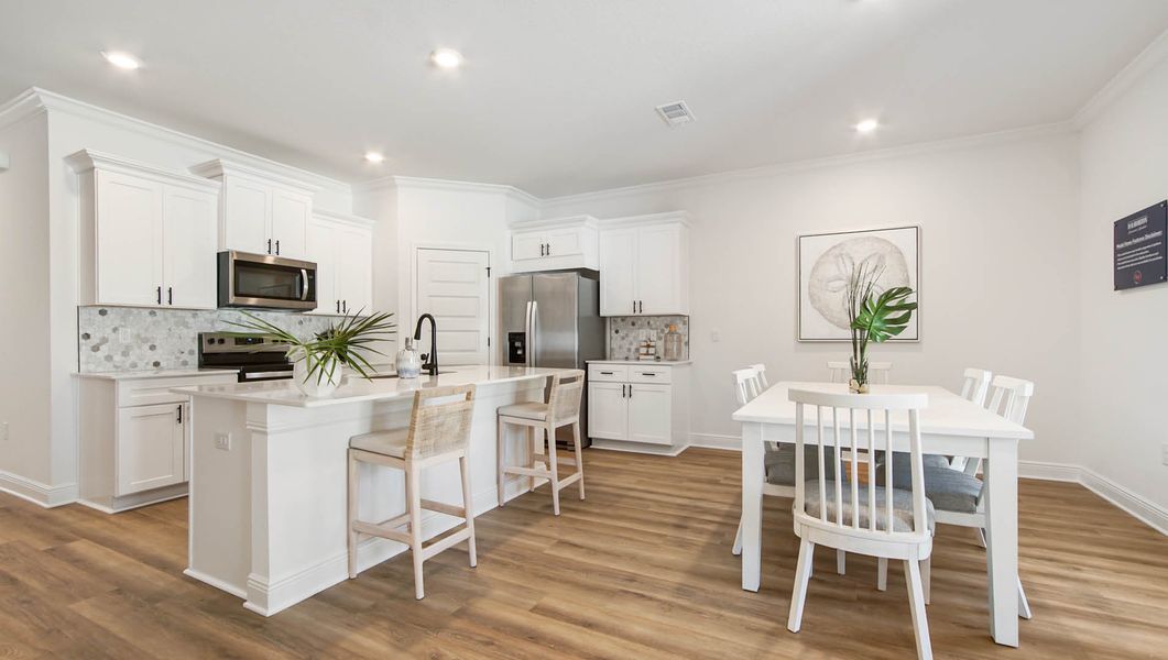 Furnished interior in a model home at Nellie Preserve in Santa Rosa Beach (Image 6).