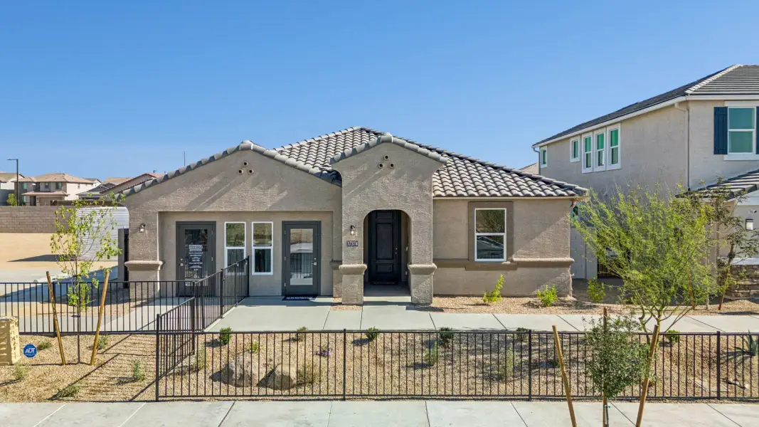 Front exterior of a home in the El Cidro community, located in Goodyear, AZ (Image 2). Front exterior of a home in the El Cidro community, located in Goodyear, AZ (Image 2).