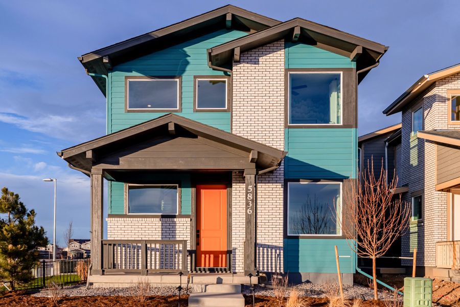 Front exterior of a home in the Painted Prairie community, located in Aurora, CO (Image 14).