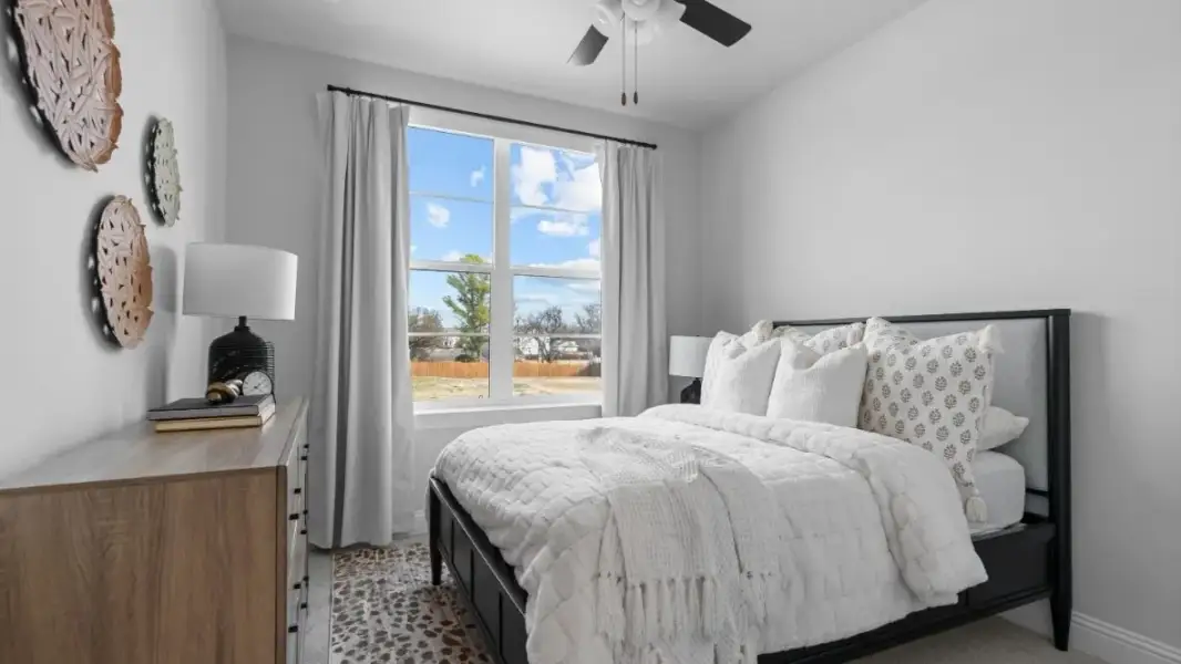 Furnished interior in a model home at Grace Woods in Carrollton (Image 44).