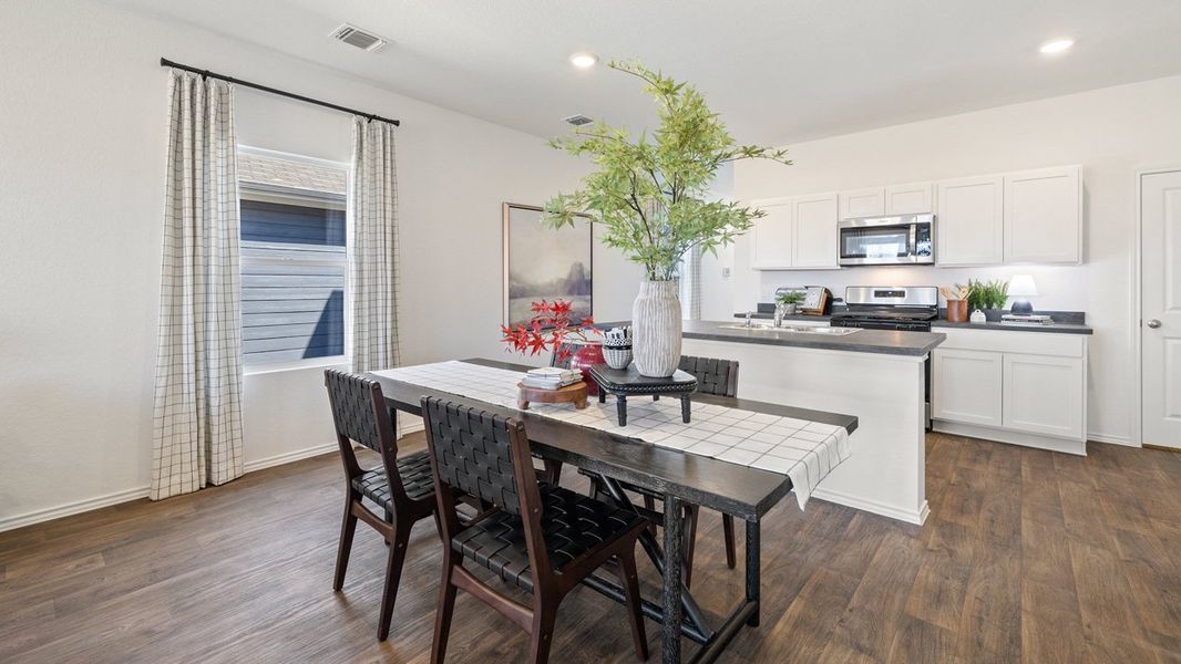 Furnished interior in a model home at The Reserve at Spiritas Ranch in Little Elm (Image 13).