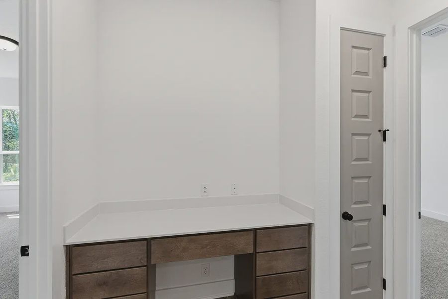 Furnished interior in a model home at Grand Lakes Estates in Montgomery (Image 14).