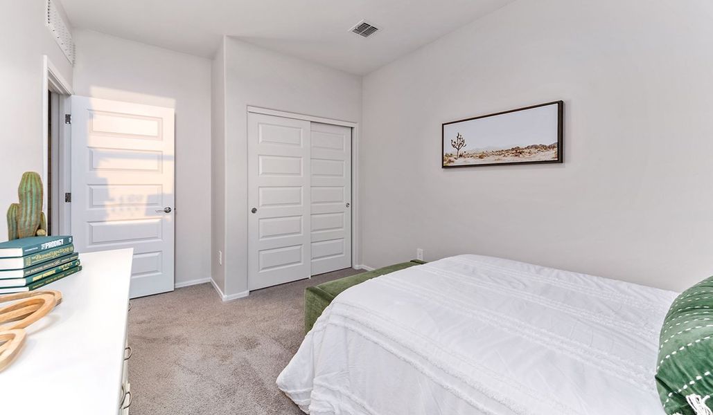 Furnished interior in a model home at Coronet at Gladden Farms in Marana (Image 58).