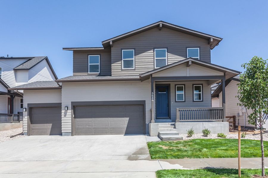 Front exterior of a home in the Trailside community, located in Timnath, CO (Image 20).