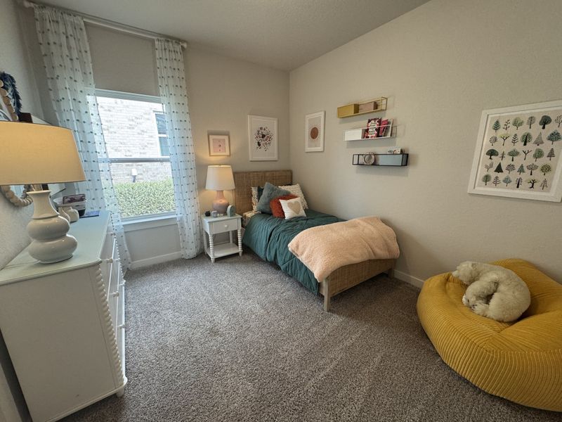 A cozy bedroom with a plush bed, soft lighting, and a sunny reading nook, perfect for rest and relaxation. A cozy bedroom with a plush bed, soft lighting, and a sunny reading nook, perfect for rest and relaxation.