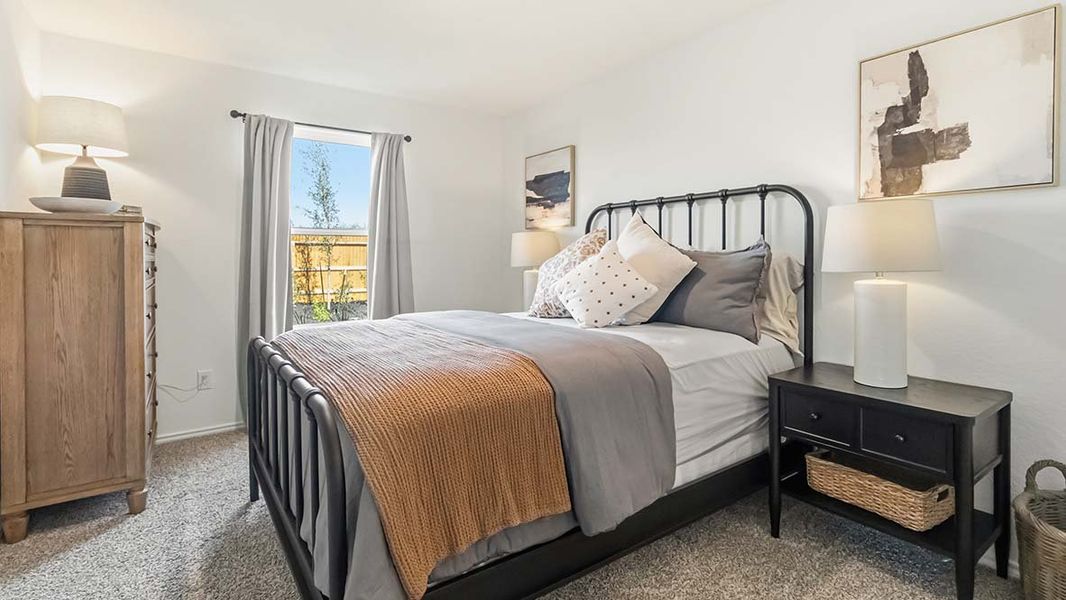 Furnished interior in a model home at Hickory Ridge in Elmendorf (Image 18).