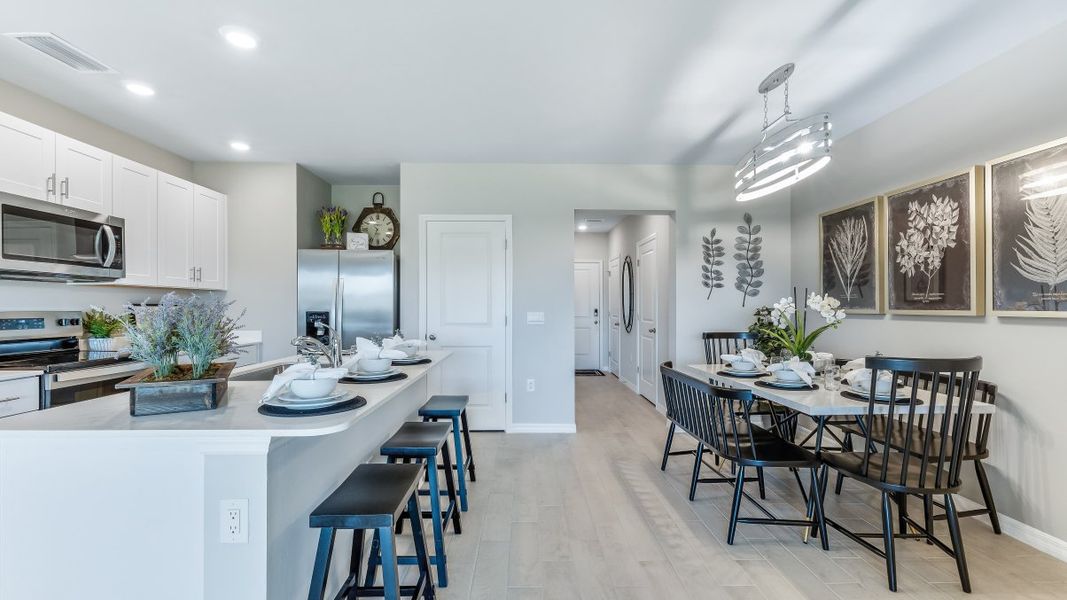 Furnished interior in a model home at Asher Park in Lehigh Acres (Image 15).