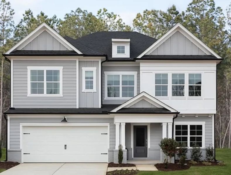 Front exterior of a home in the Rowland's Grant community, located in Fuquay Varina, NC (Image 13).