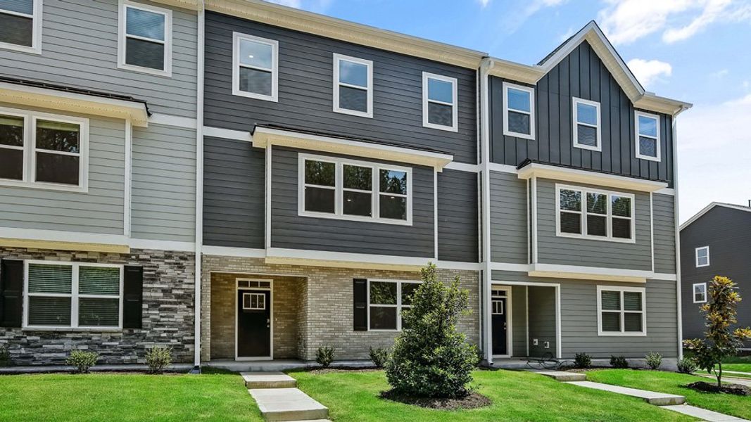Front exterior of a home in the The Townes Park community, located in Apex, NC (Image 2). Front exterior of a home in the The Townes Park community, located in Apex, NC (Image 2).