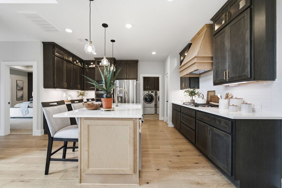 Furnished interior in a model home at Grand Magnolia in Waller (Image 25).