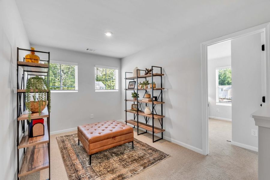 Furnished interior in a model home at Sweetlake Grove in Mableton (Image 6).
