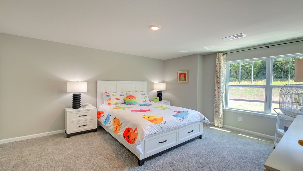 Furnished interior in a model home at Rydele Heights in Weaverville (Image 8).