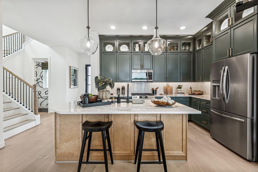 Furnished interior in a model home at Elyson 40' in Katy (Image 7).