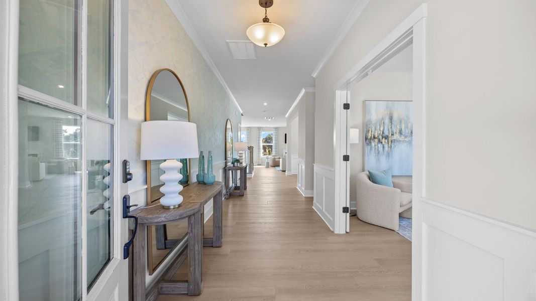 Furnished interior in a model home at Farms at Bellingham in Mooresville (Image 3).