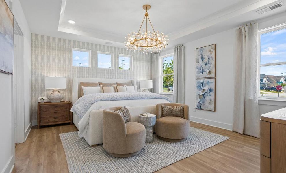 Furnished interior in a model home at The Enclave at Hidden Lake - 55+ Community in Youngsville (Image 13).