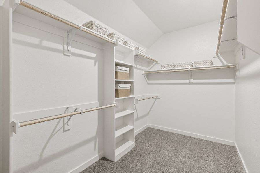 REPRESENTATIVE PHOTO – Primary Closet in the Oscar model home in Aledo TX by Trophy Signature Homes