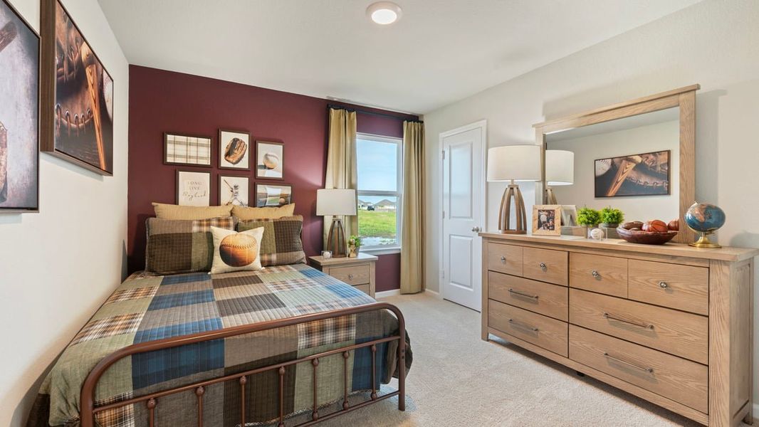 Furnished interior in a model home at Grand Lake in Snook (Image 5).