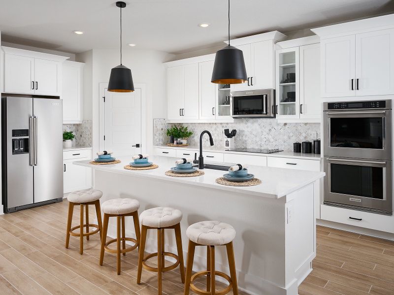 Furnished interior in a model home at Magnolia Bay - Reserve Series in Nokomis (Image 8).