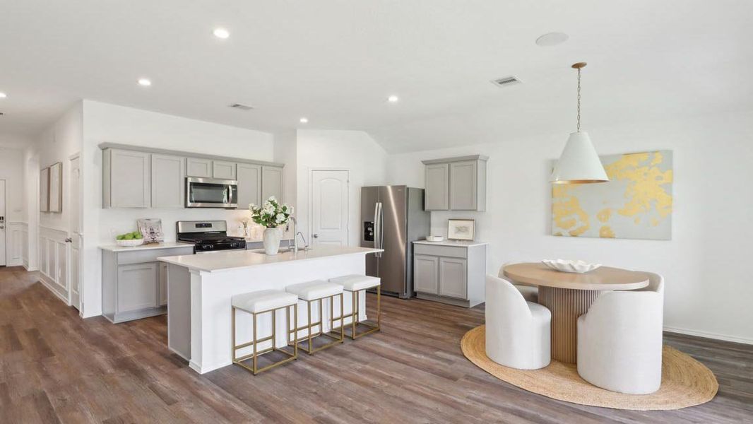 Furnished interior in a model home at Grand Pines in Magnolia (Image 6).