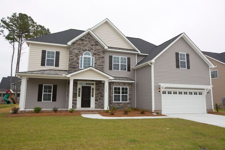 Front exterior of a home in the The Preserve at Langston community, located in Winterville, NC (Image 1).