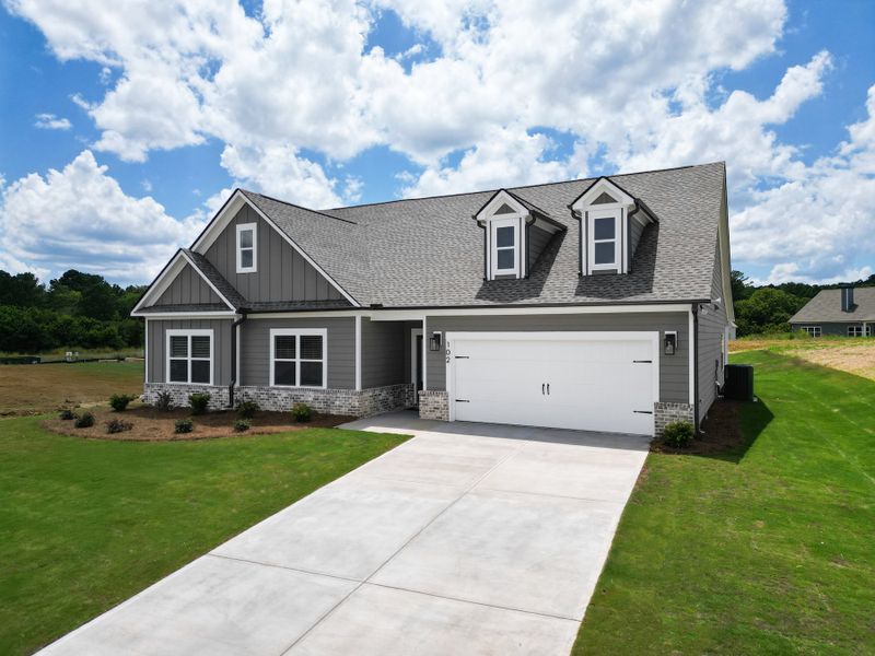 Front exterior of a home in the Harmony Farms community, located in Eatonton, GA (Image 5). Front exterior of a home in the Harmony Farms community, located in Eatonton, GA (Image 5).