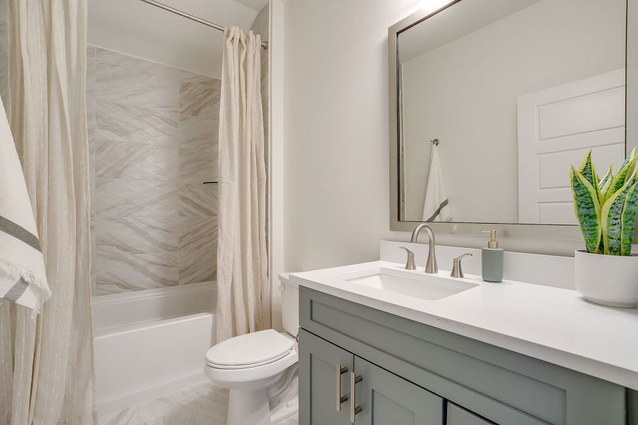 Furnished interior in a model home at MidTowne in Midlothian (Image 42).