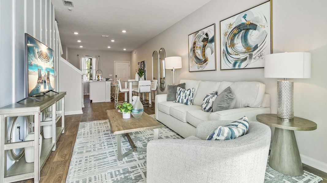 Furnished interior in a model home at Stokes Landing Express in St. Augustine (Image 8).