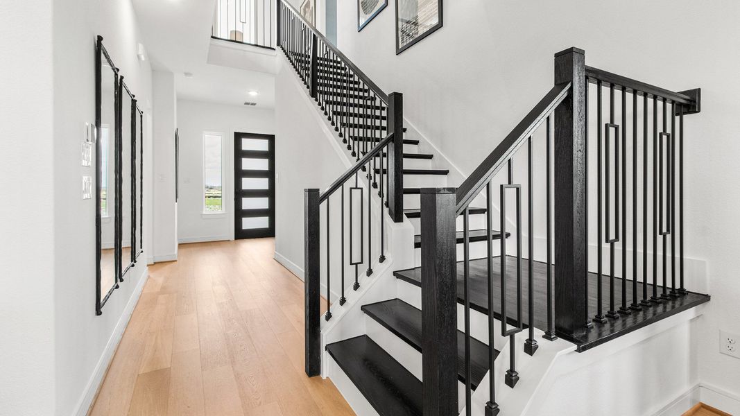 Furnished interior in a model home at Bridgeland Central in Cypress (Image 26).