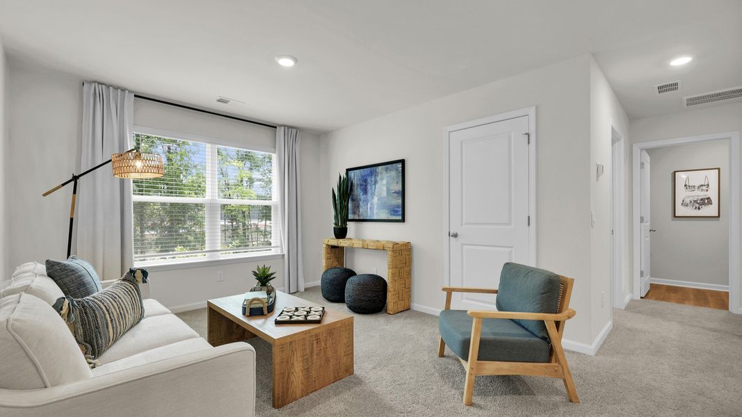 Furnished interior in a model home at The Cove at Mallard Crossing in Summerville (Image 23).