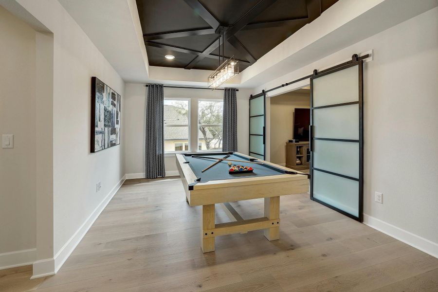 Furnished interior in a model home at Lariat - 60' in Liberty Hill (Image 24).