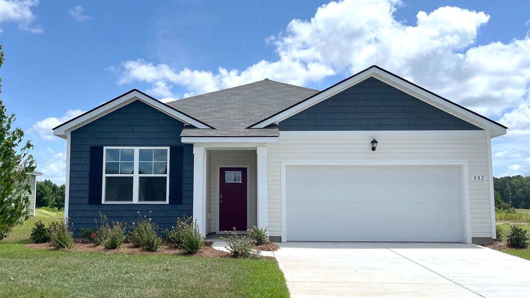 Front exterior of a home in the Sutton Farm community, located in Loris, SC (Image 10).