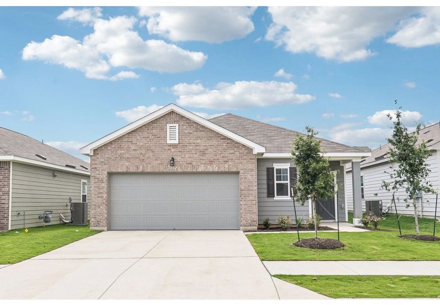 Front exterior of a home in the Rolling Glen community, located in Hutto, TX (Image 9).