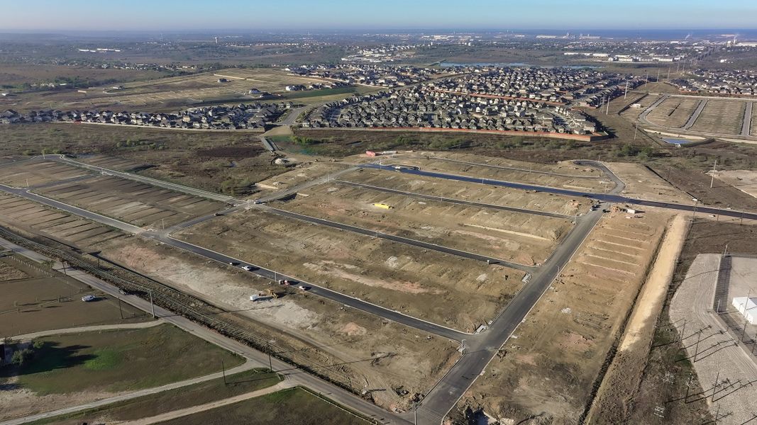 Site preparation and early development at Sunfield in Mustang Ridge, TX (Image 52).