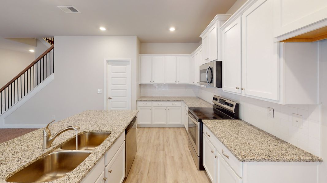 Furnished interior in a model home at Barrington Place in Macon (Image 4).