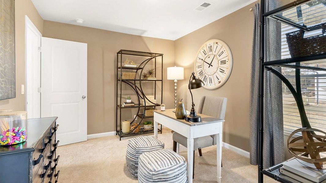 Furnished interior in a model home at Captain's Corner in Grovetown (Image 18).