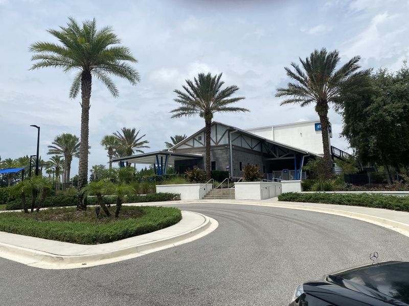 Contemporary community center with lush landscaping in Kettering at eTown - Paired Villas by David Weekley Homes (Jacksonville, FL).