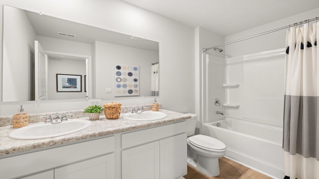 Furnished interior in a model home at Oakleigh Glen in Dallas (Image 20).