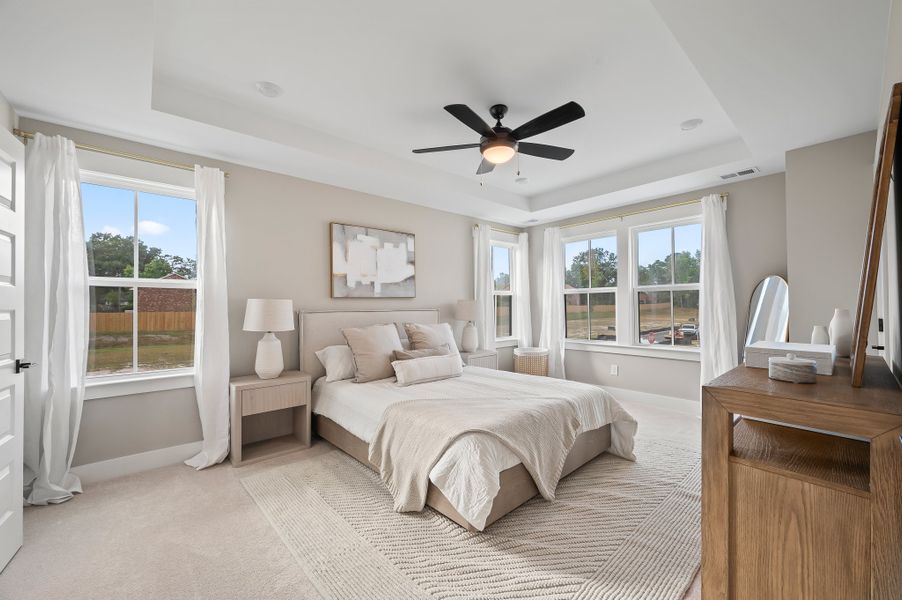 Furnished interior in a model home at Windward Townes in Goose Creek (Image 12).