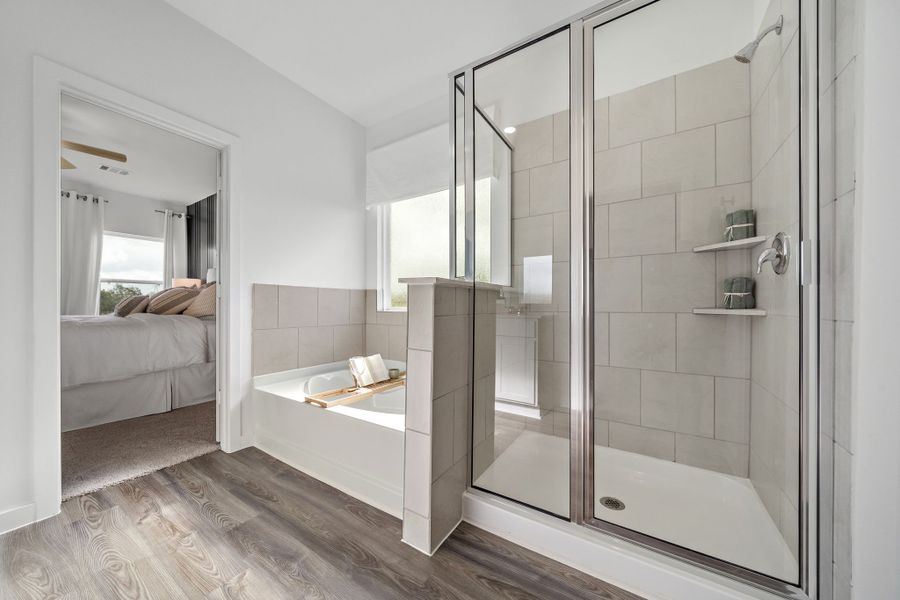 A bathroom with a glass shower.