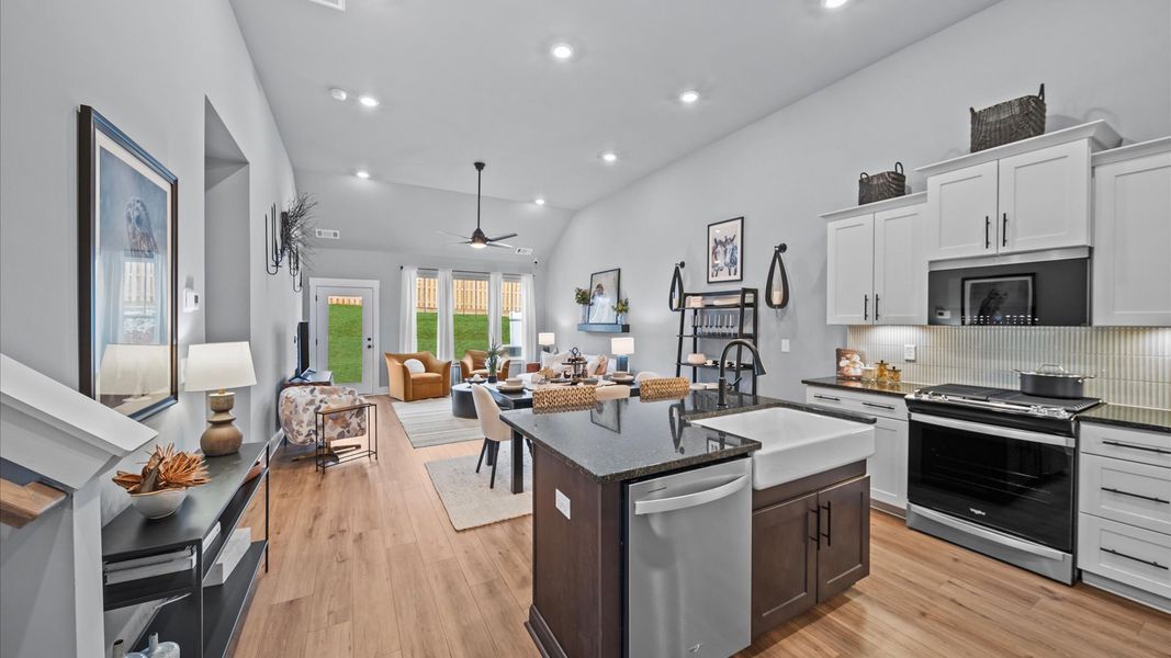 Elevated entry way with hardwood flooring, access to office space, and bright white walls at Aspen Ridge by DRB Homes Elevated entry way with hardwood flooring, access to office space, and bright white walls at Aspen Ridge by DRB Homes